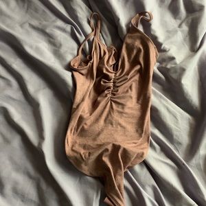 light pink lululemon body suit